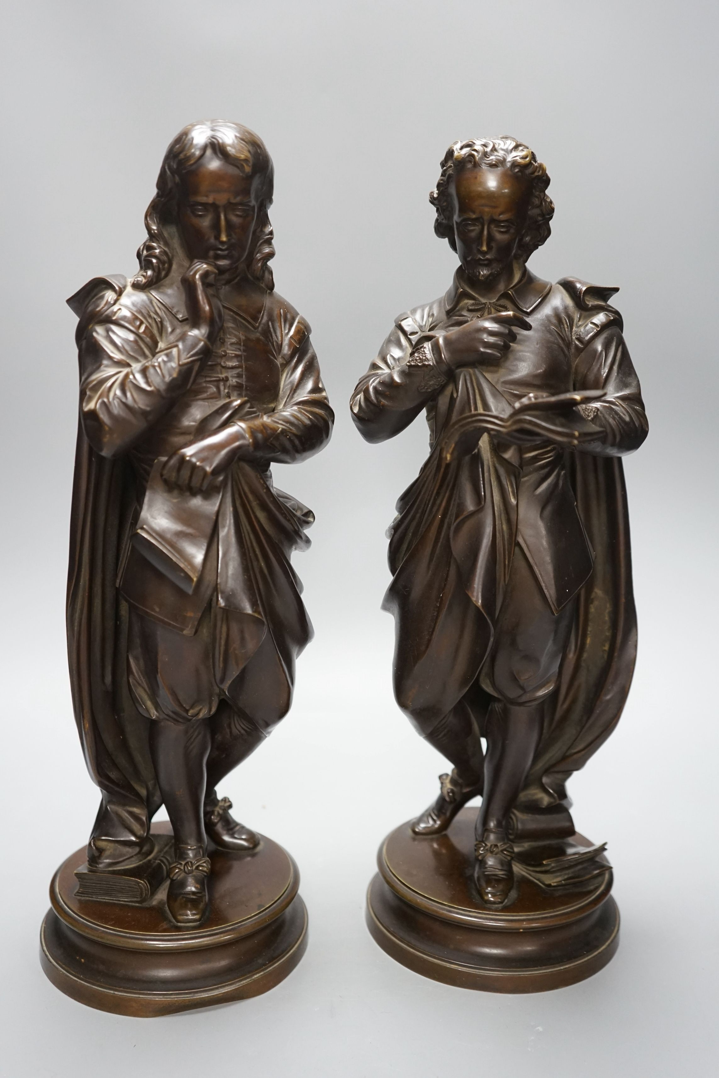 A pair of late 19th century French bronze figures of Shakespeare and Milton, tallest 44cms